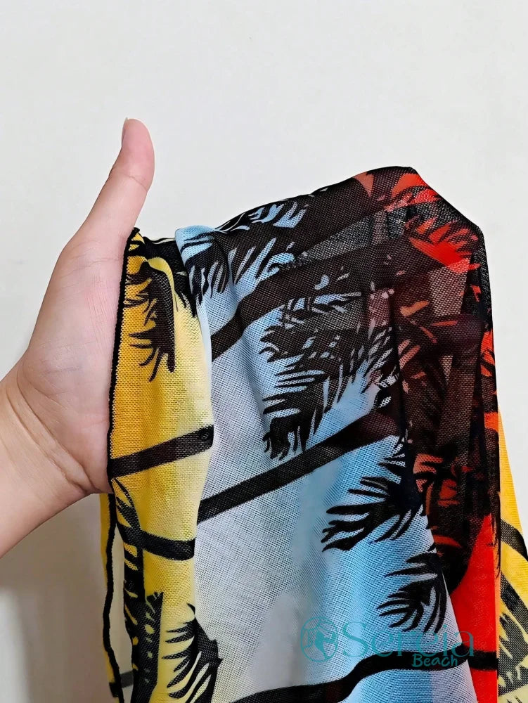 Biquíni Top Triângulo com Saída de Praia Estampada Biquíni Top Triângulo com Saída de Praia Estampada