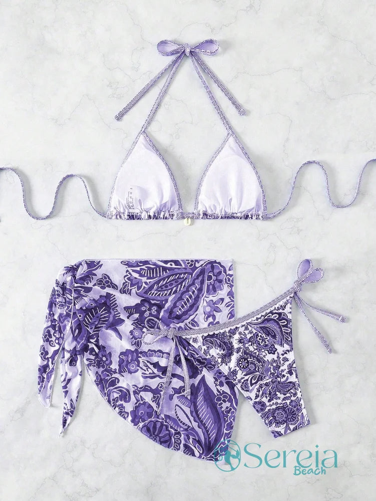Conjunto de Biquíni com Estampa Azul e Saia Pareô Conjunto de Biquíni com Estampa Azul e Saia Pareô