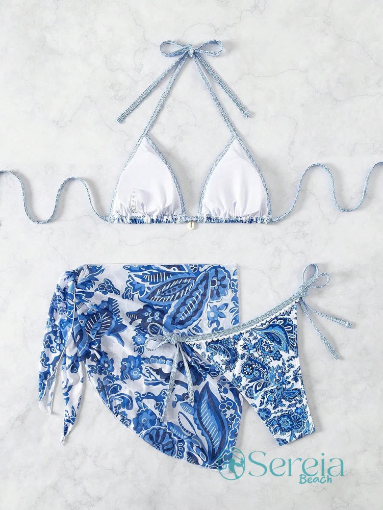 Conjunto de Biquíni com Estampa Azul e Saia Pareô Conjunto de Biquíni com Estampa Azul e Saia Pareô