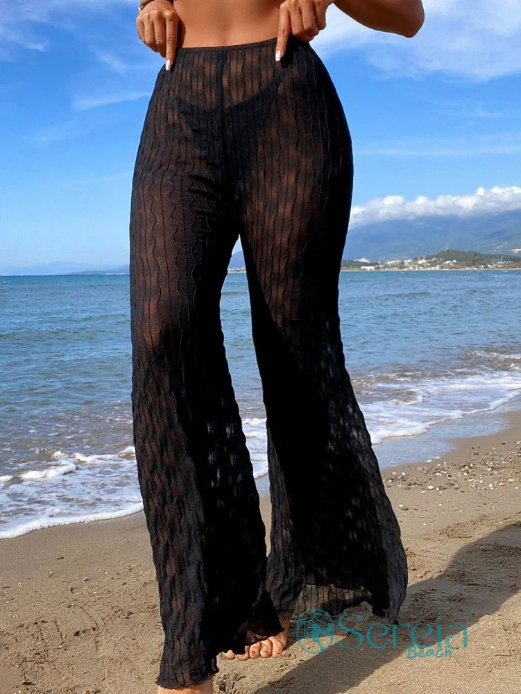 Saída de Praia Calça Flare em Tecido Transparente Saída de Praia Calça Flare em Tecido Transparente
